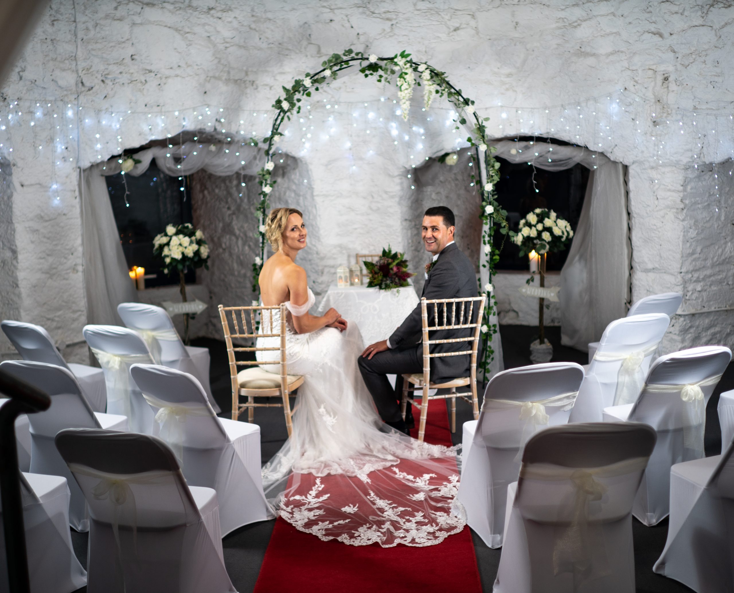 Photo of bride and groom in the castle's wedding setup
