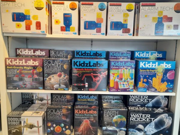 A range of science kits and toys on dislplay in a gift shop