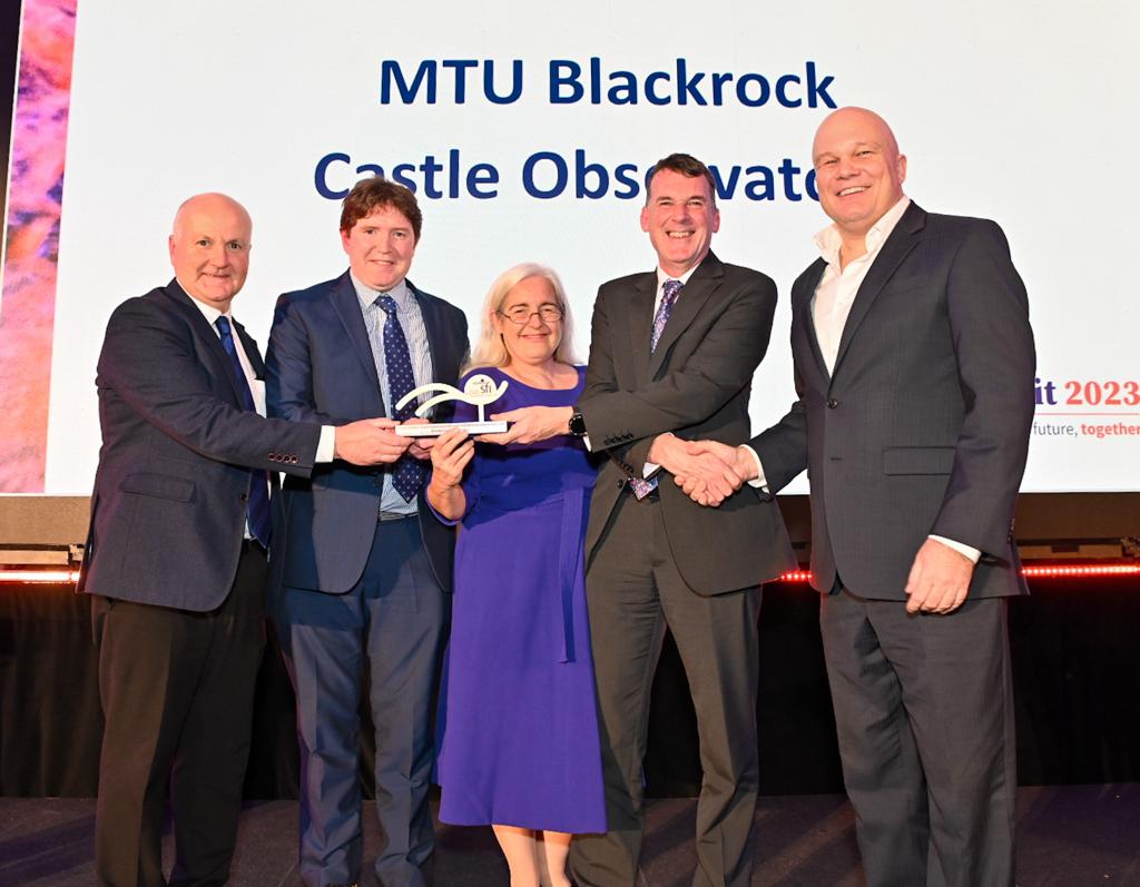 Staff members from MTU Blackrock Castle Observatory on stage receiving an award.